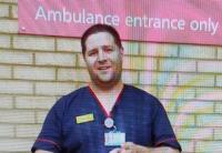 Josh from our Palliative Care team outside A&E at Queen's Hospital